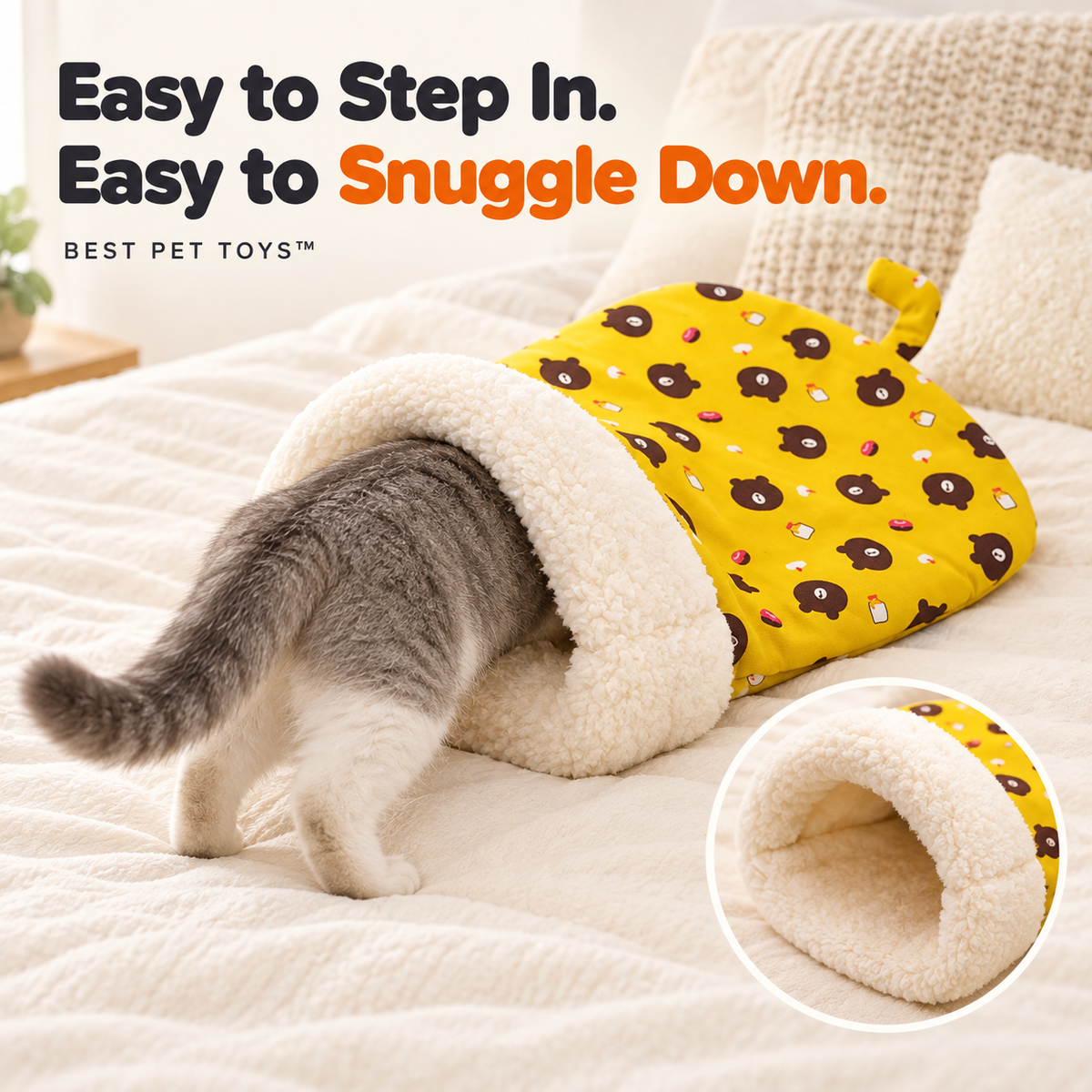 Cat entering the yellow sleeping bag with a close-up of its soft open entrance