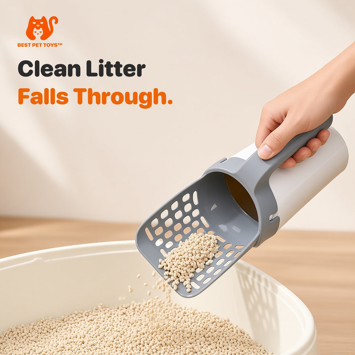 Close-up of the slotted scoop letting clean litter fall through