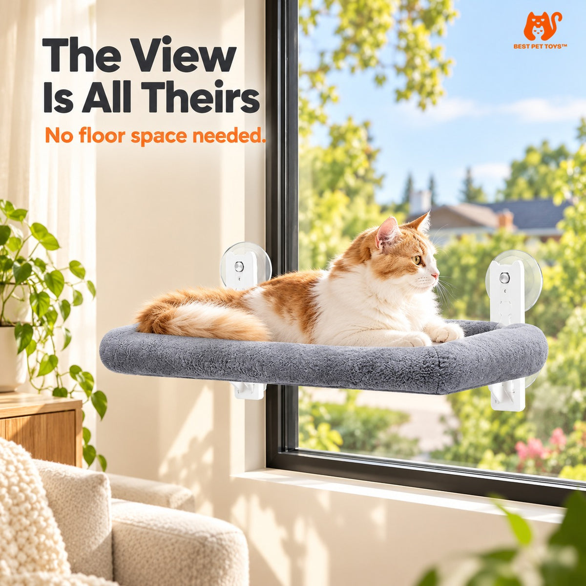 Cat enjoying the view from gray window hammock