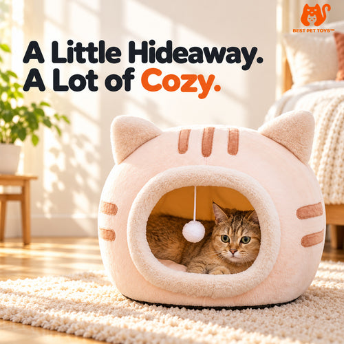 Pink cat cave bed with cat resting inside in sunny home