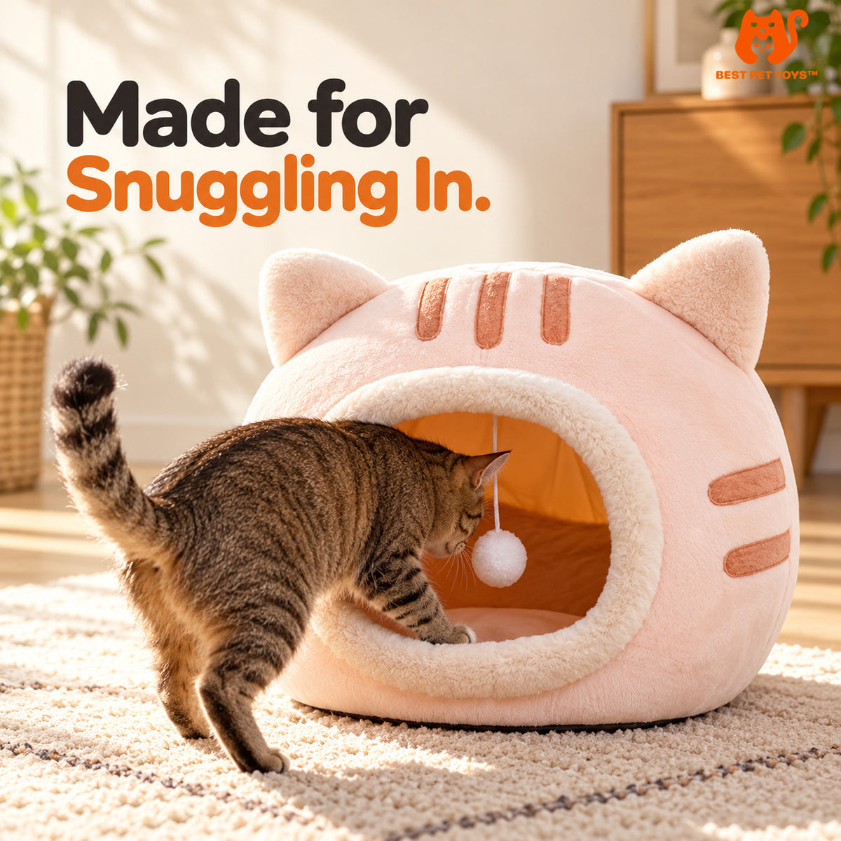Cat entering pink Whisker Haven cat cave bed